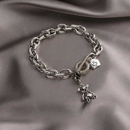 Stylish Silver - toned Chain Bracelet with Teddy - bear and Cross - emblem Charms