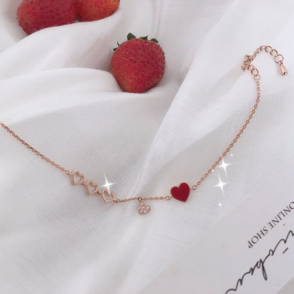 Adorable Rose - gold Heart - themed Bracelet with Enamel and Crystal Accents