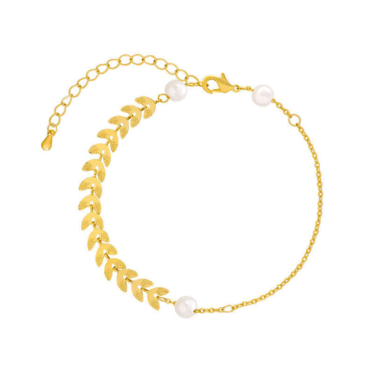 Gorgeous Gold - toned Bracelet with Leaf - shaped Motifs and Pearl Accents