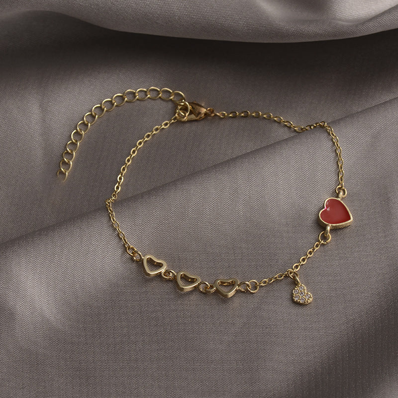 Adorable Rose - gold Heart - themed Bracelet with Enamel and Crystal Accents